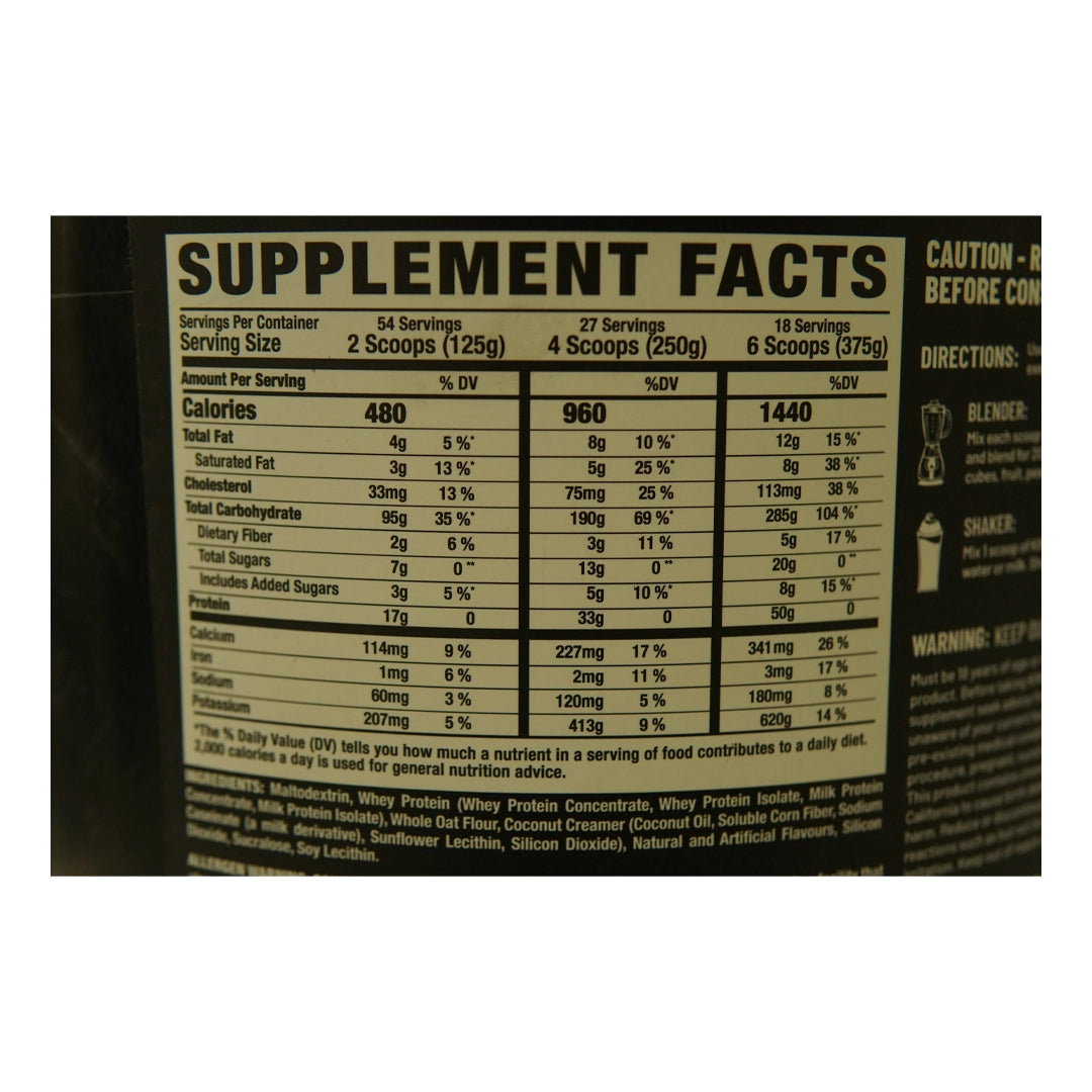 Supplement facts for Ronnie Coleman King Mass XXL 15 Lb, featuring whey protein, casein protein, creatine, and healthy fats for muscle growth and performance.