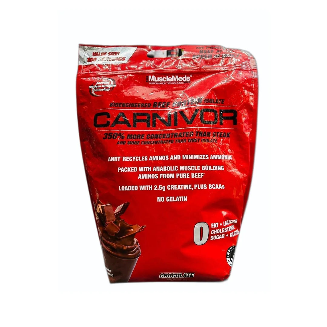 Red package of MuscleMeds Carnivor protein powder on a white background