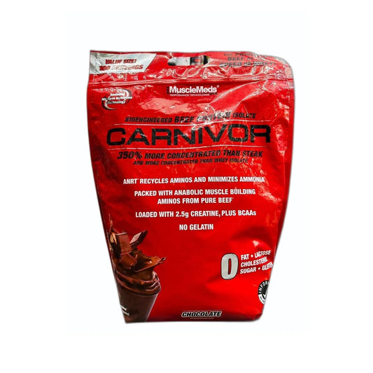 Red package of MuscleMeds Carnivor protein powder on a white background
