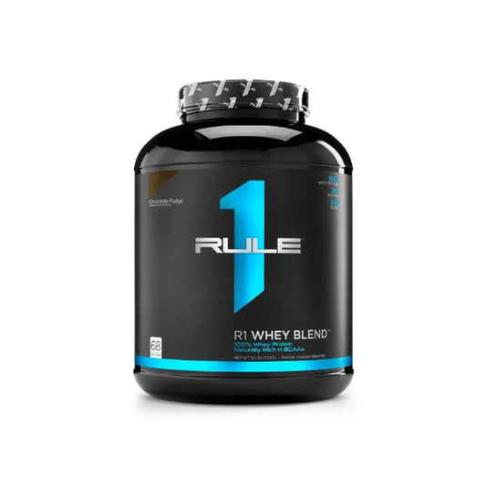 Rule 1 whey blend protein powder container on a white background